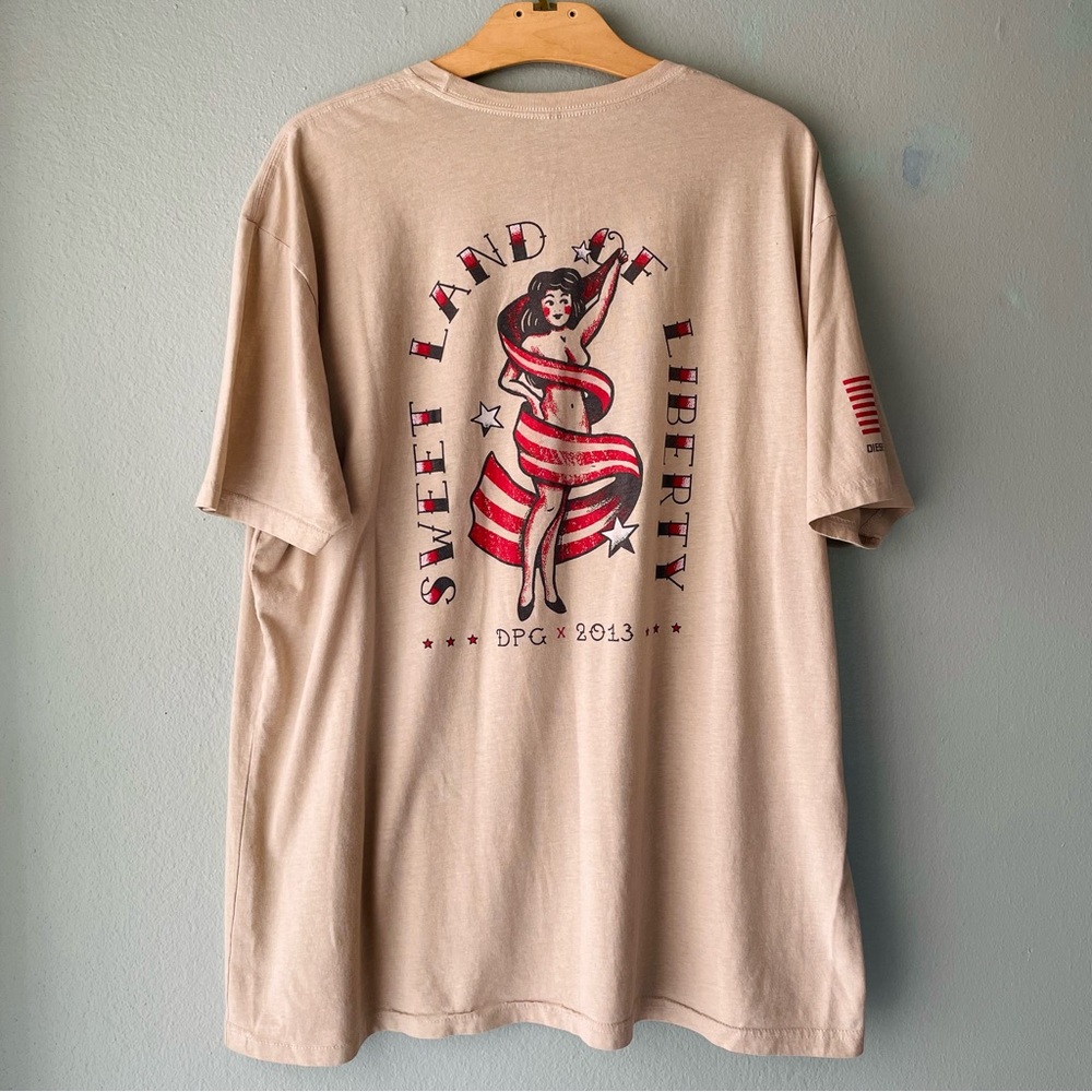 ♦️5/$15♦️Diesel Power | Tan Distressed “Sweet Land Of Liberty” PinUp Girl Tee
